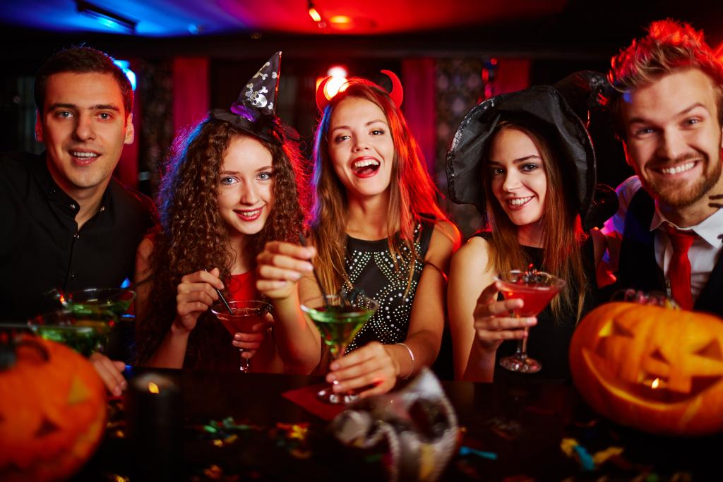 Halloween party-goers at a Portland bar in 2025