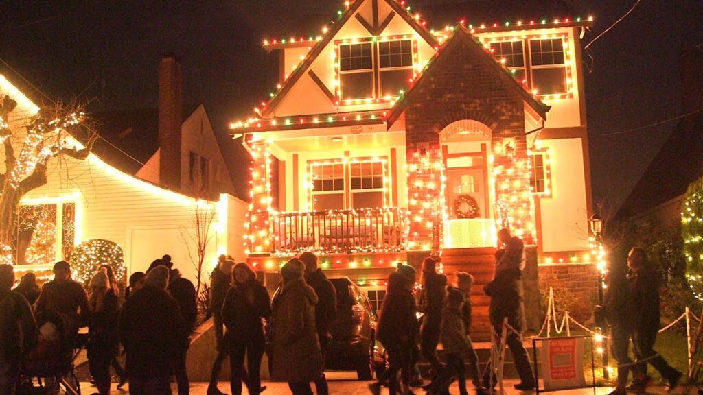 Families enjoying the illuminated displays at Peacock Lane Christmas lights 2025.