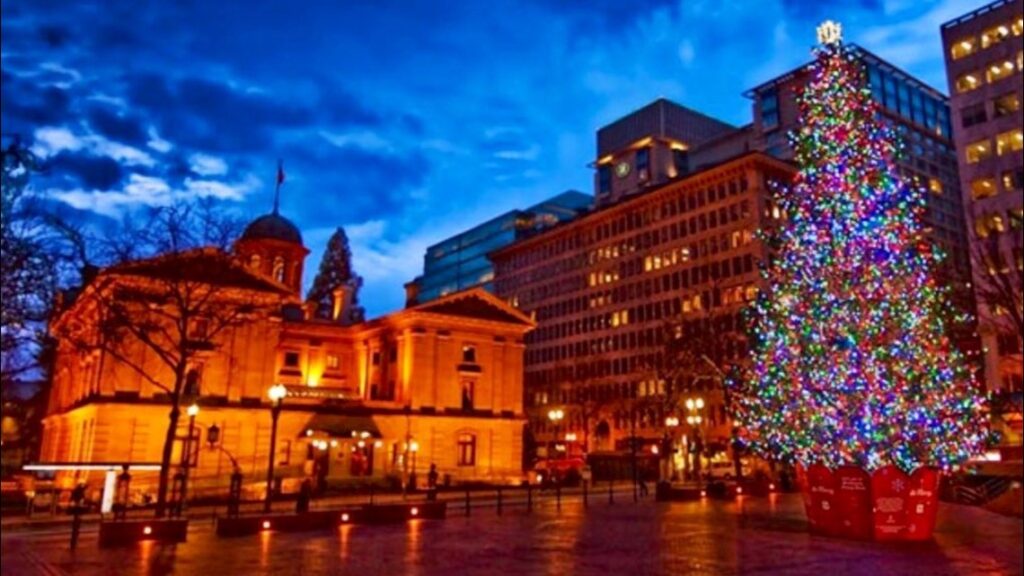 Pioneer Courthouse Square Portland Christmas tree lighting 2025 celebration at night.